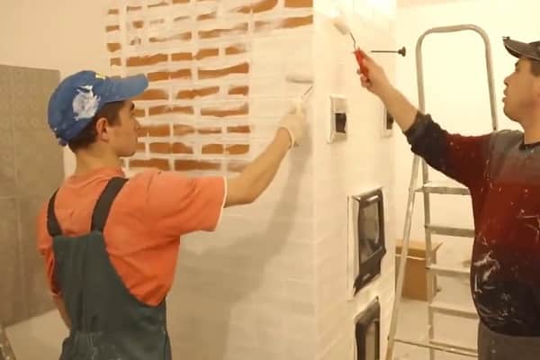 how to paint a brick stove in a house: the painting process