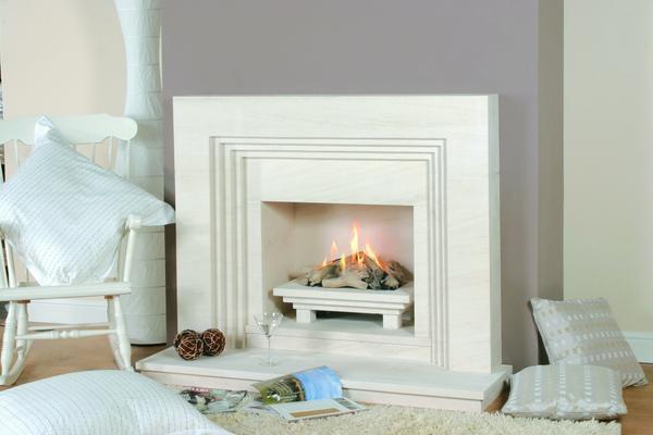 Before installing a false fireplace, you should think about its place in the interior of the room in advance.