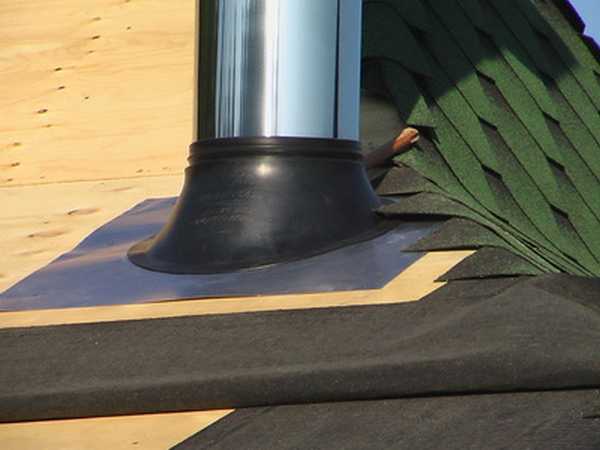 When a pipe passes through a roof covered with soft tiles, its edges are placed on the chimney or apron