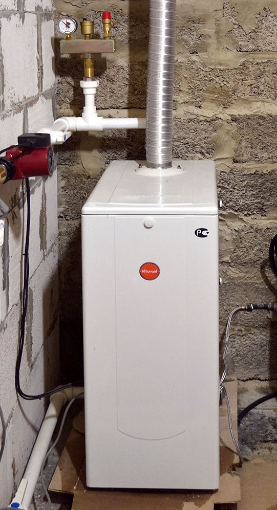 An example of a Kiturami liquid fuel boiler in a house